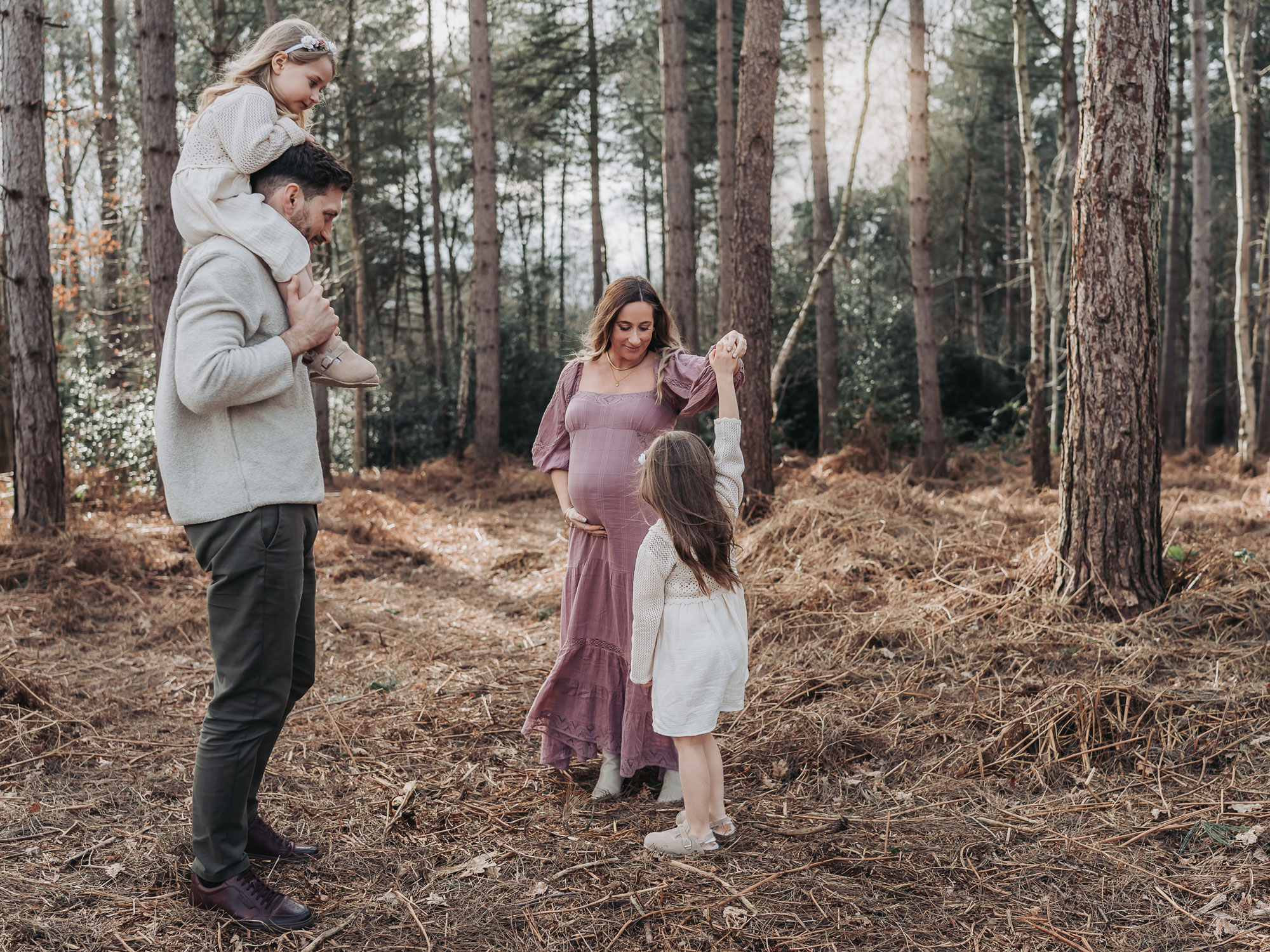 Maternity family photoshoot in the woods with mum in purple Free People dress
