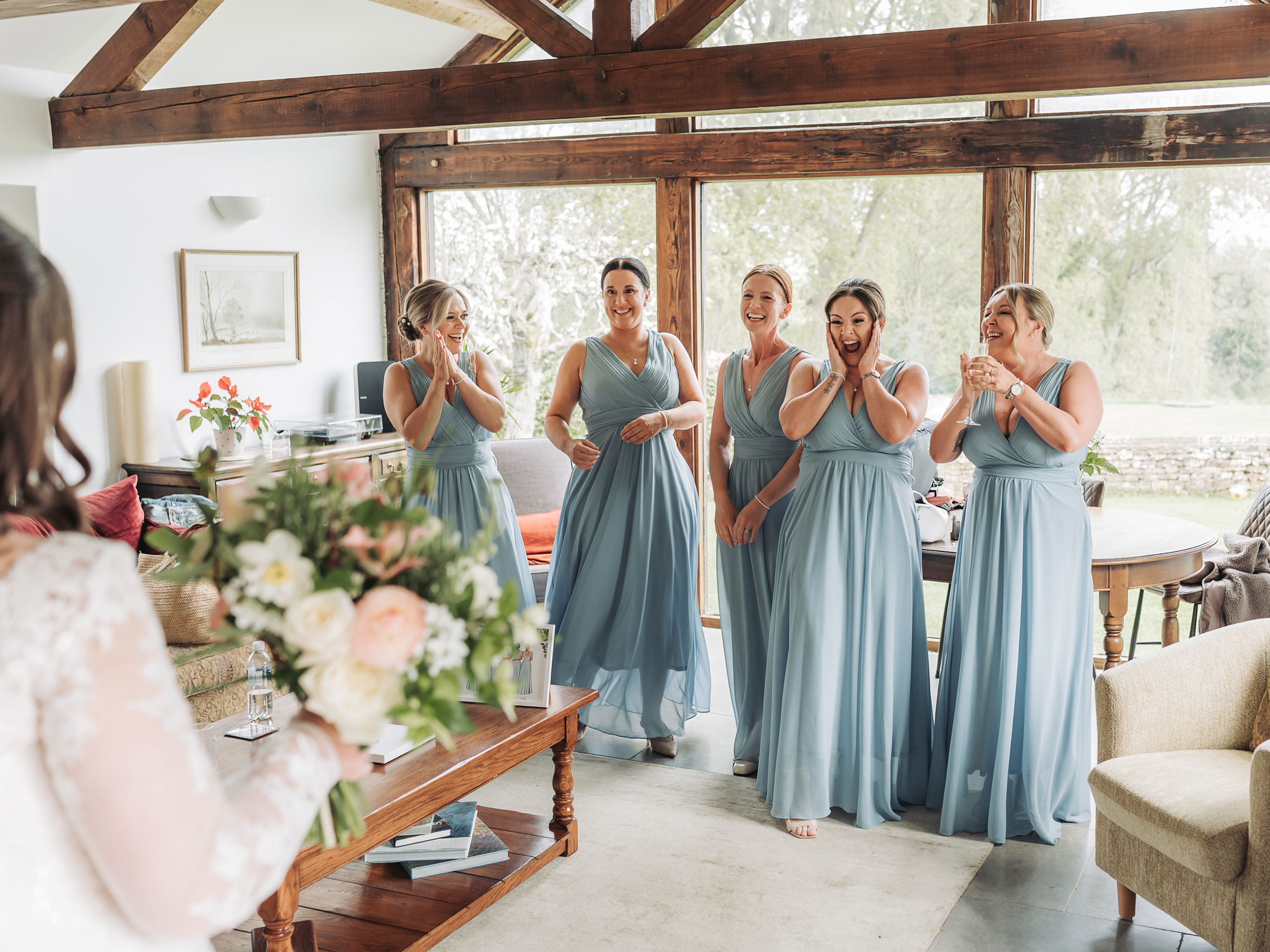 Bridal reveal to excited bridesmaids