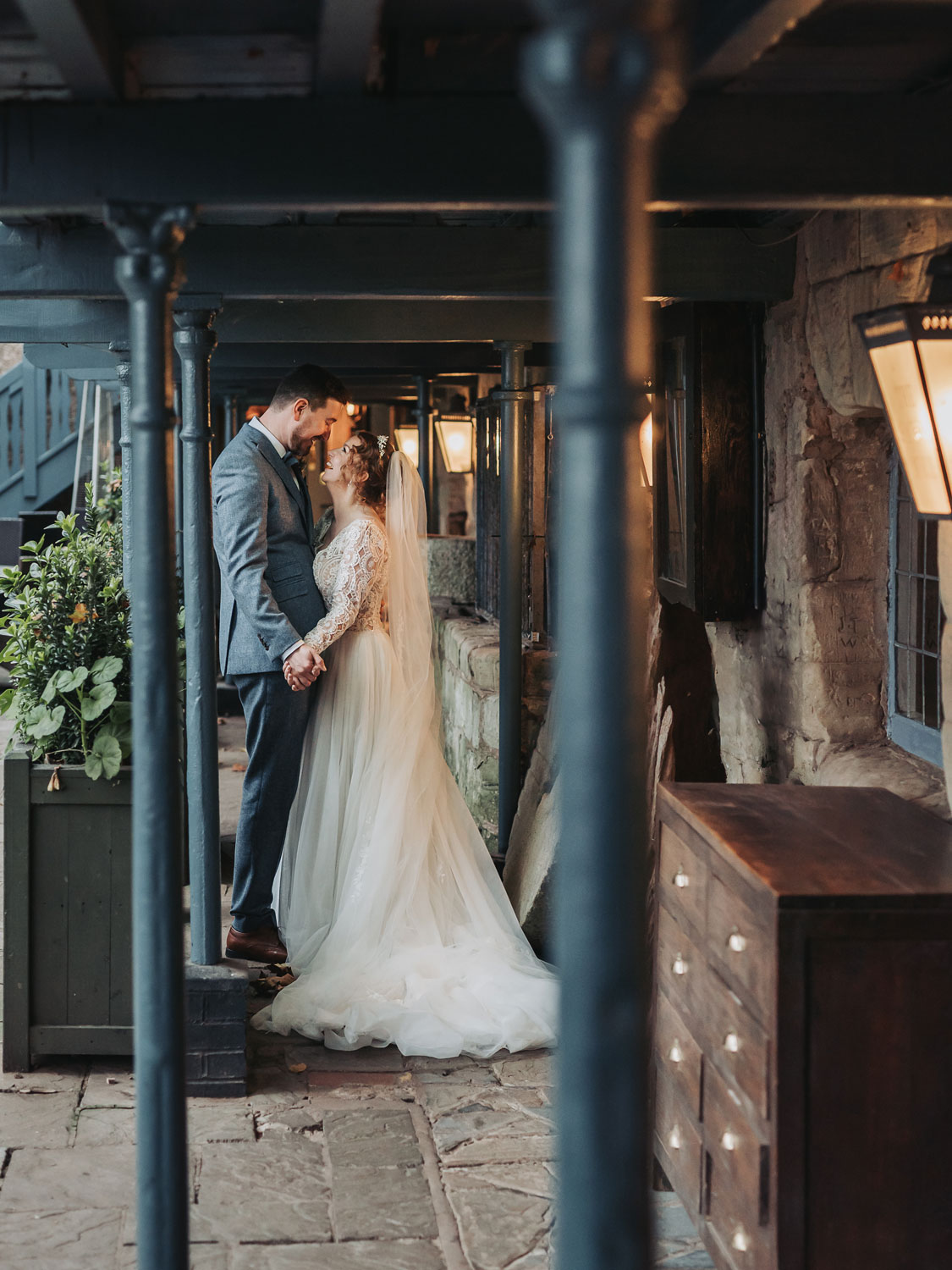 Couple portrait under cover at Saxon Mill weddings