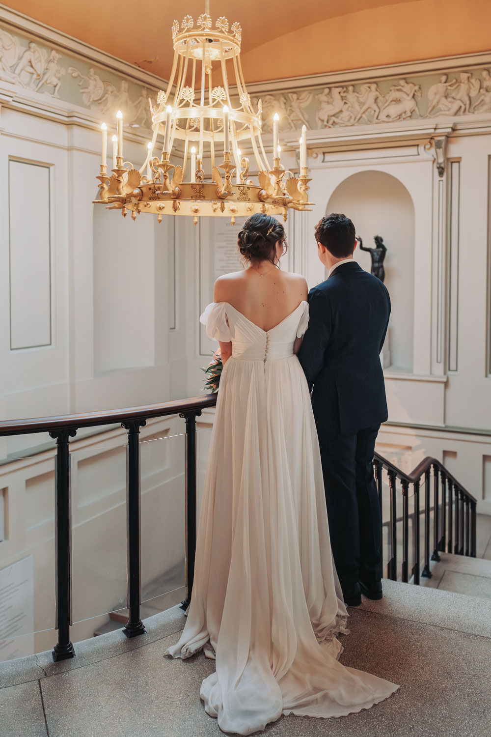Couple on stairs at Ashmolean wedding