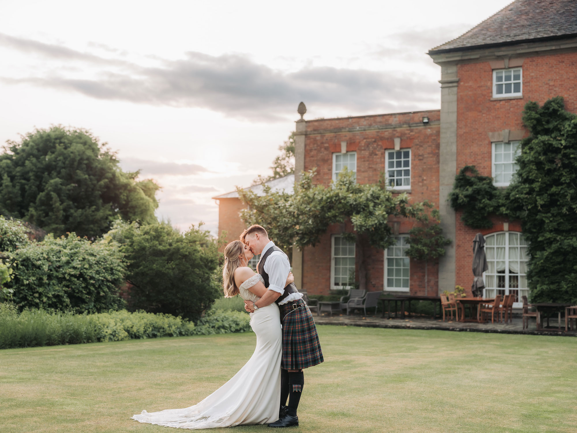 Couple portrait at golden hour at Sherbourne Park wedding