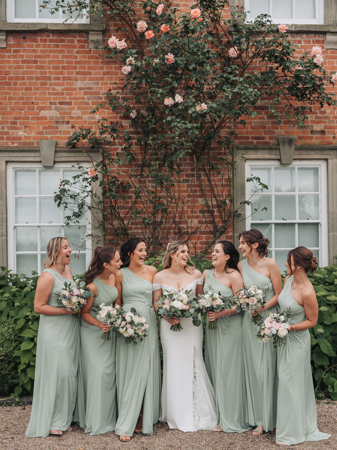 Bridal party in sage green at Sherbourne Park wedding