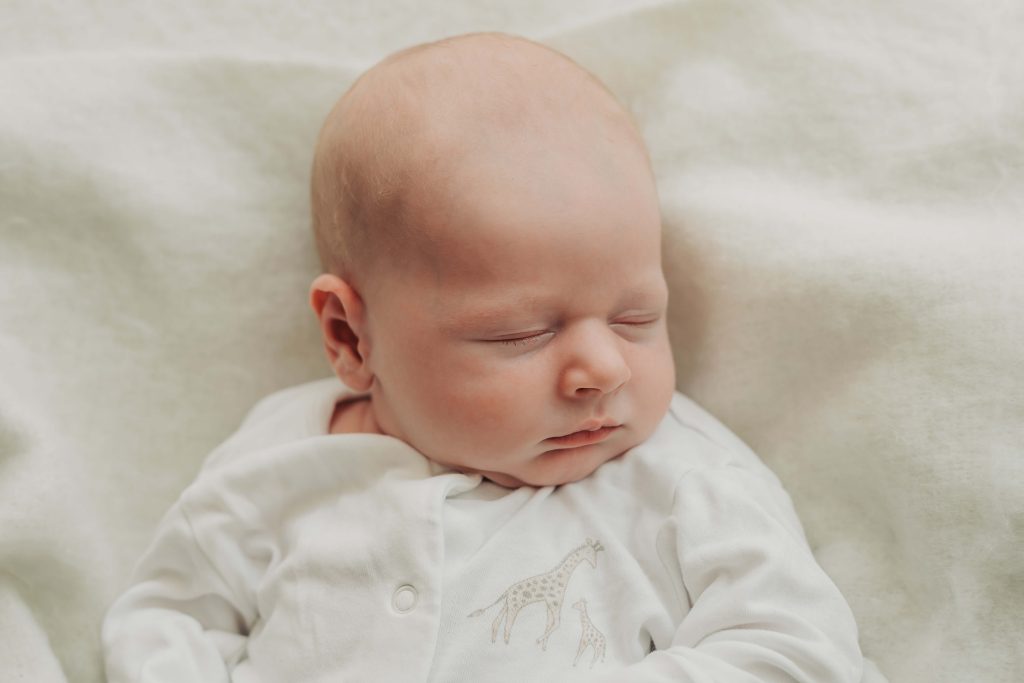 Close up of sleepy baby's face