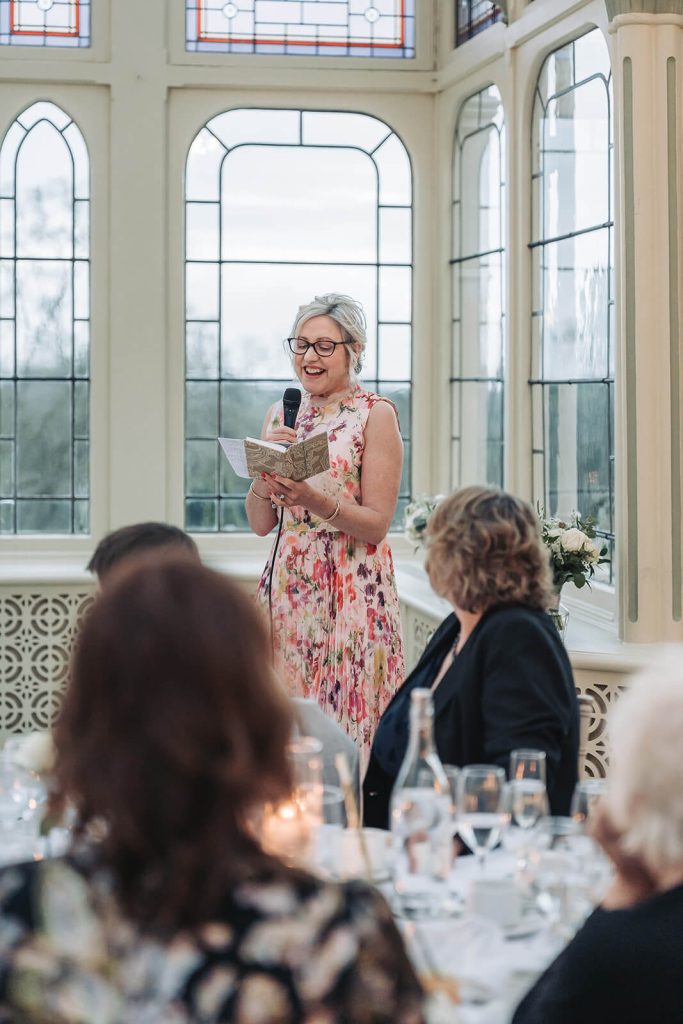 lady in pink dress giving speech at Kilworth House wedding