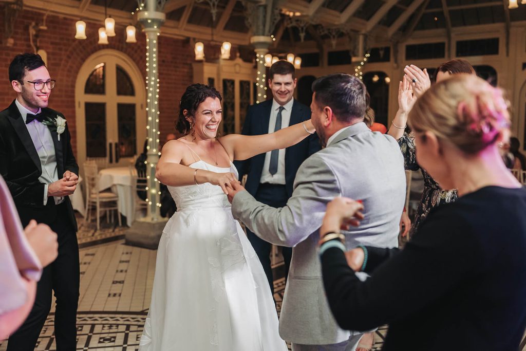 bride smiling dancing at Kilworth House
