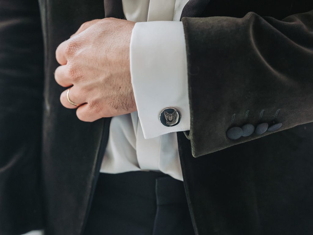 close-up of cat cufflinks