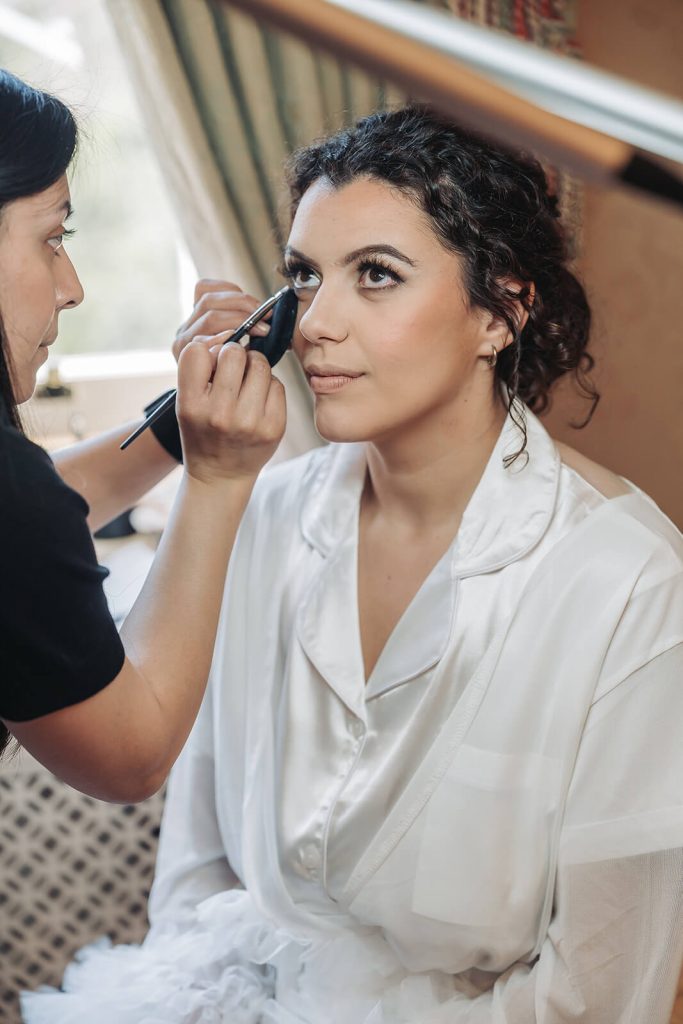 bride having make-up done at Kilworth House wedding