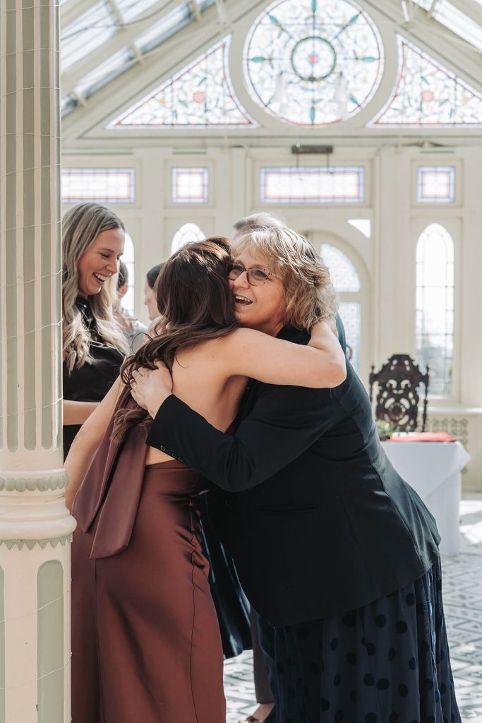 Candid photo of guests hugging