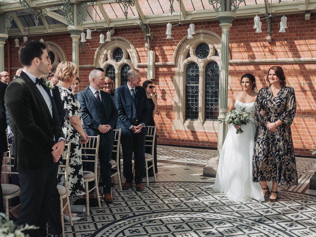 bride walking down the aisle at Kilworth House