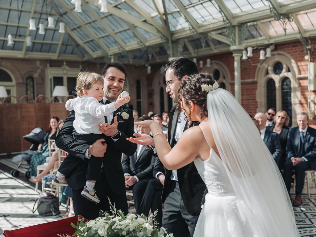 toddler boy giving rings at Kilworth House wedding