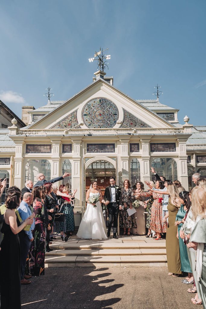 Confetti moment outside orangery at Kilworth House