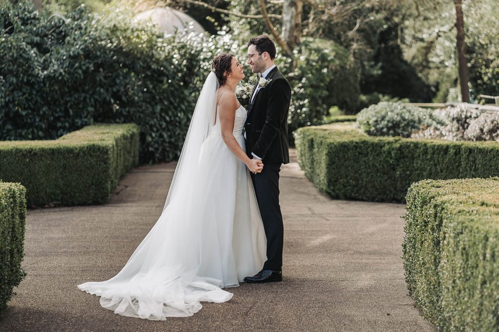 Wedding couple smiling and laughing at Kilworth House
