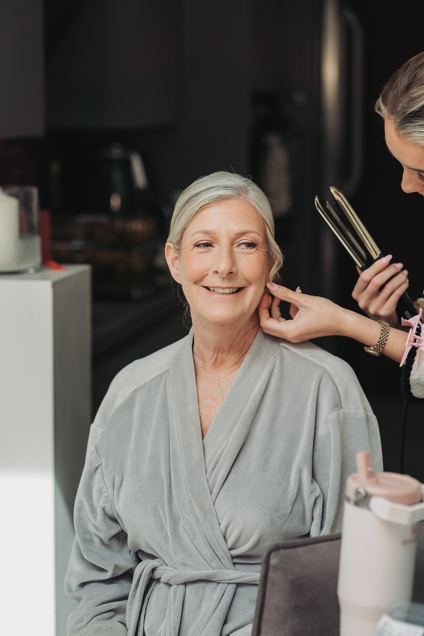 mother of bride having hair done