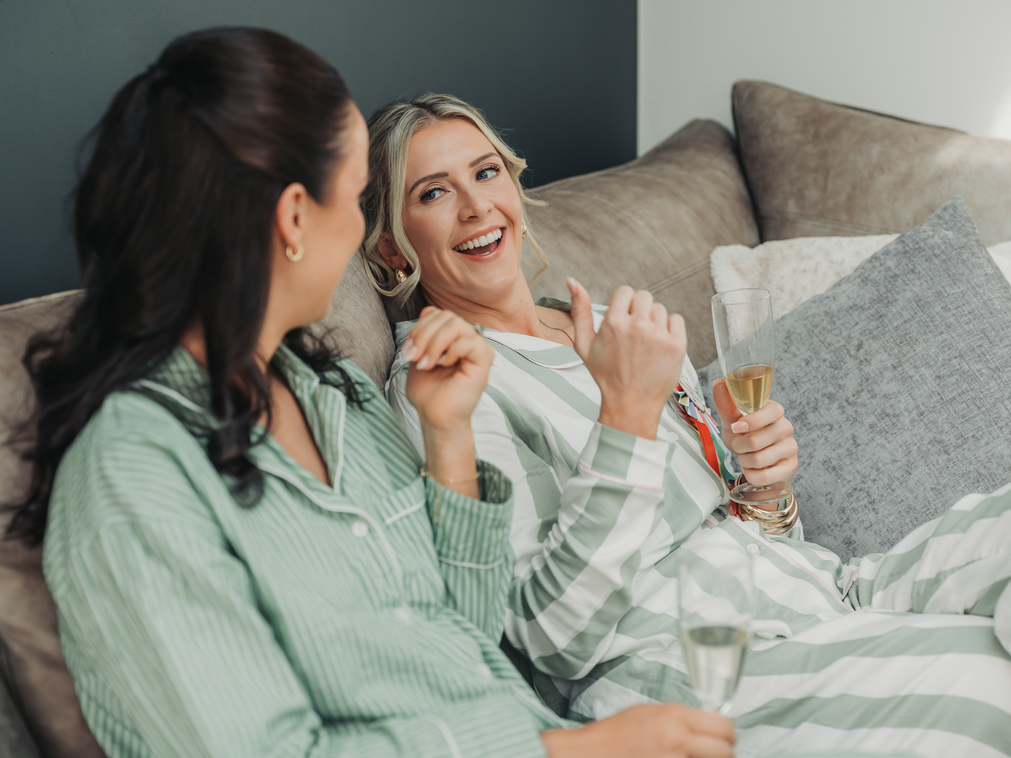 bridesmaid laughing where green striped pyjamas