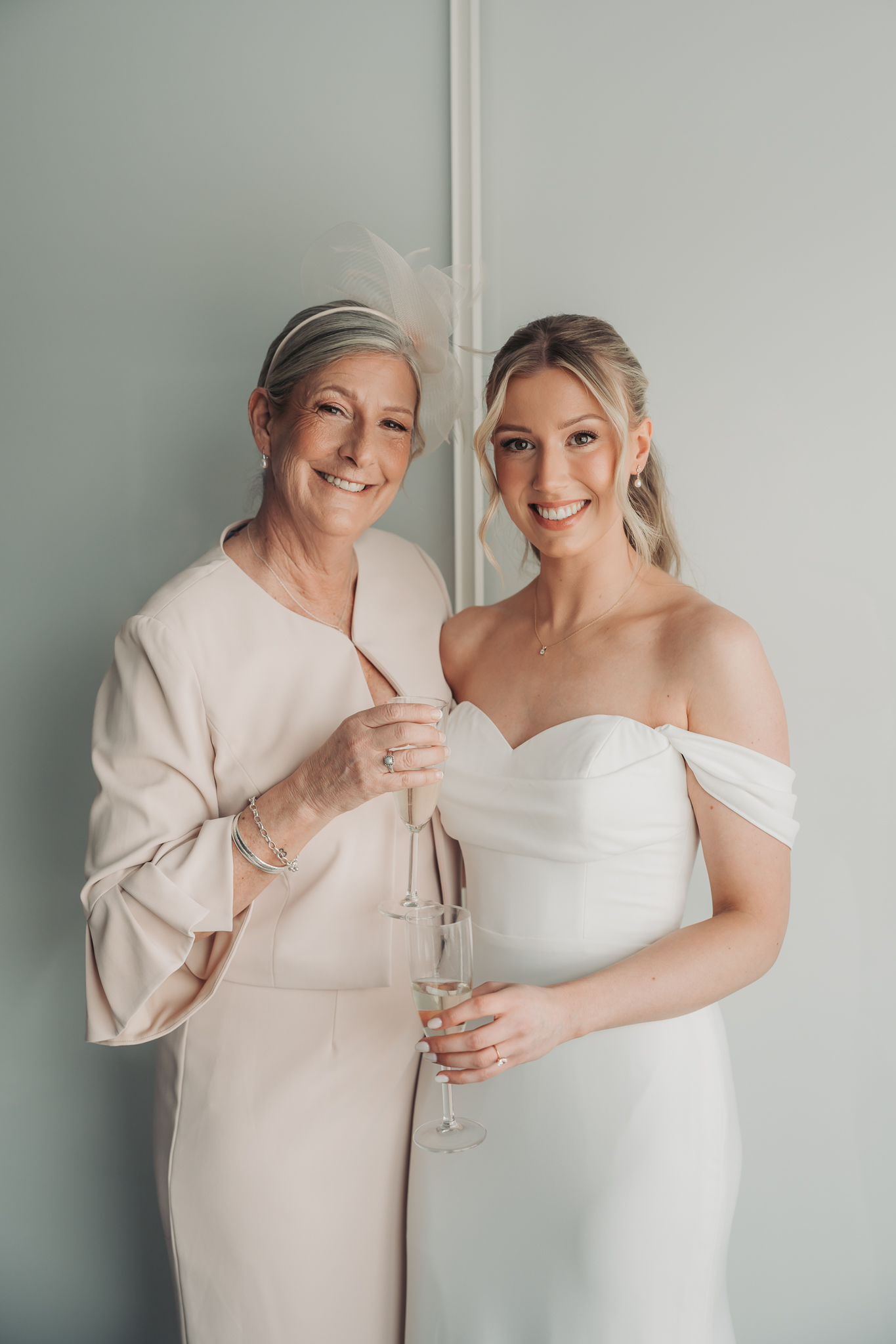 bride and mum smiling at camera