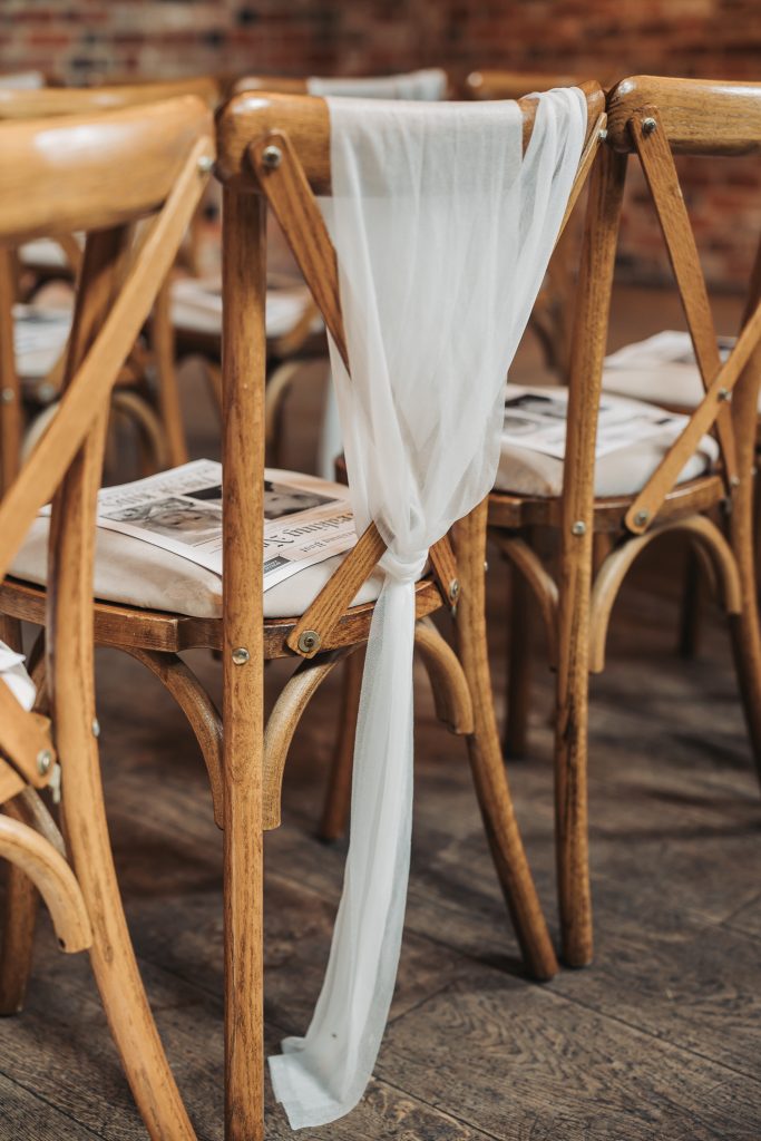 chair with drape at barn at redcoats, hitchin