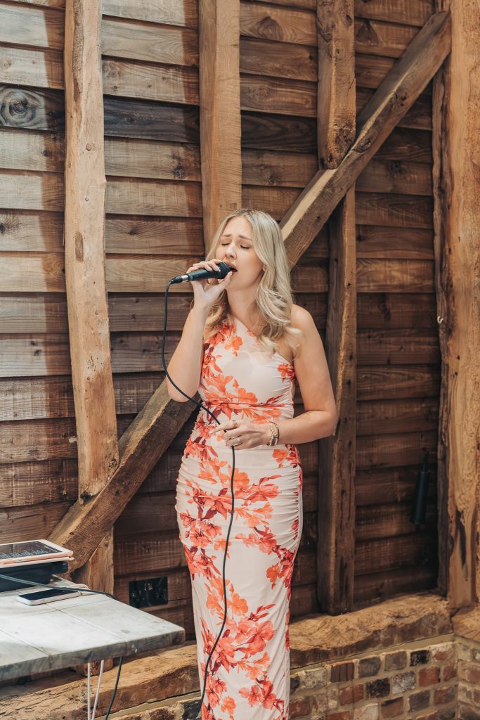 wedding singer in flowery dress