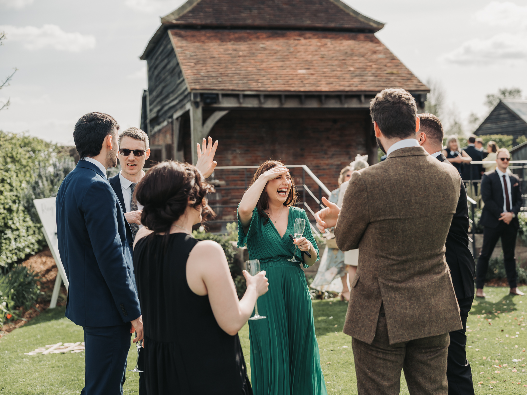 wedding guests laughing
