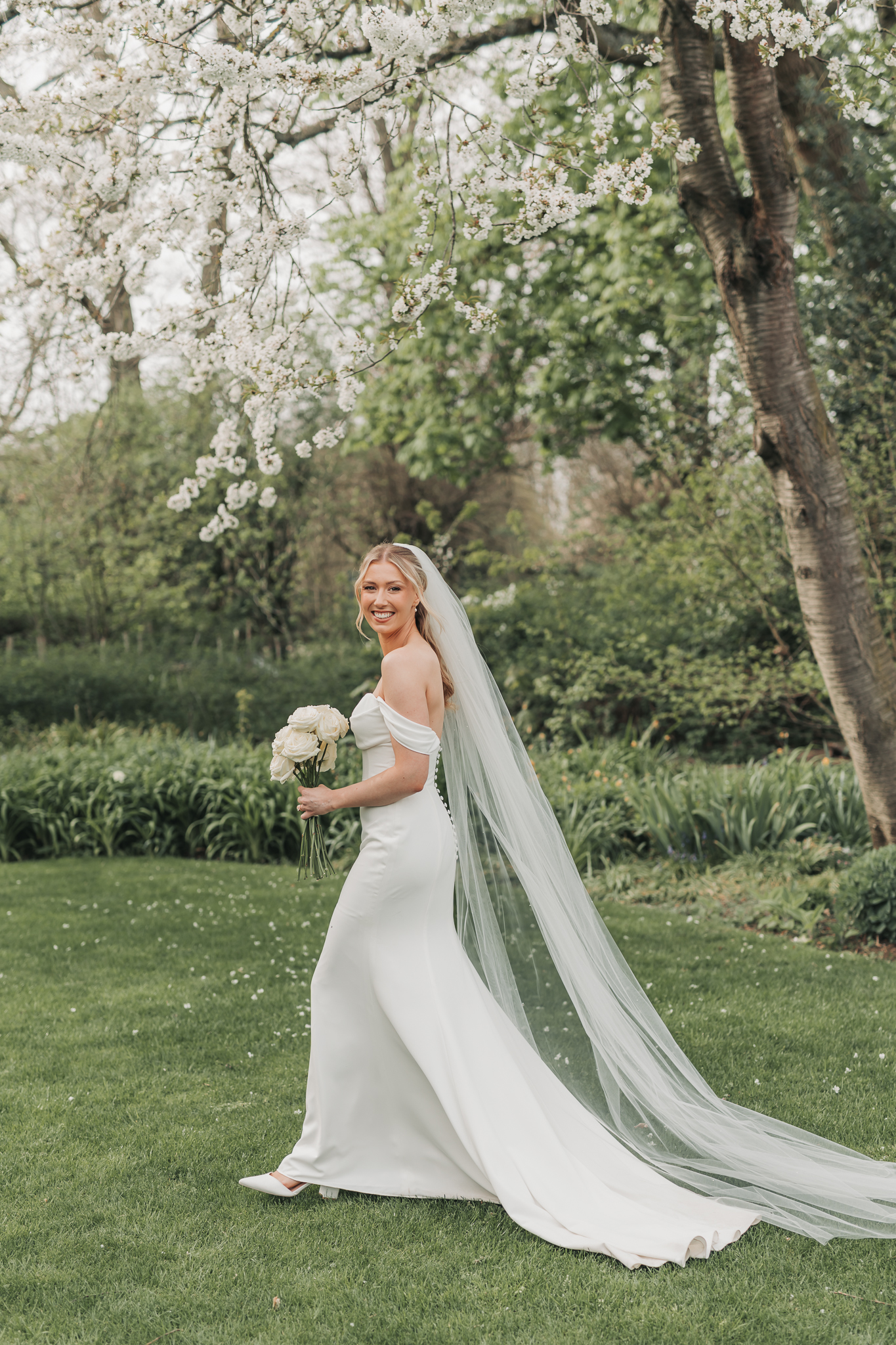 bride walking looking over her shoulder